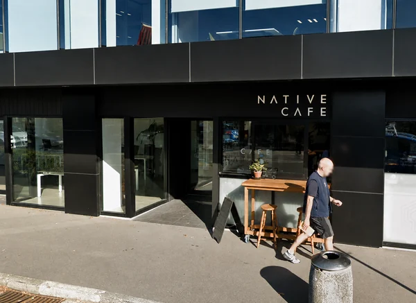 The black Native Cafe frontage and entrance at 383 Colombo Street